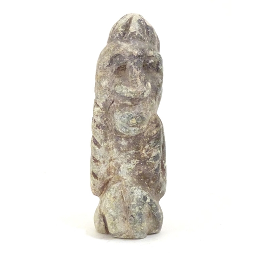 922 - A soapstone carving modelled as a stylised crouching figure. Approx. 5