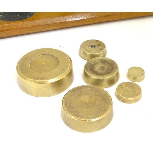 926 - A set of Victorian brass postal scales with six graduated weights. Approx. 10