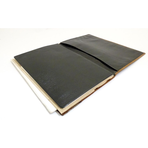 928 - An early 20thC large silver mounted leather desk stationary blotter of folding rectangular form, the... 