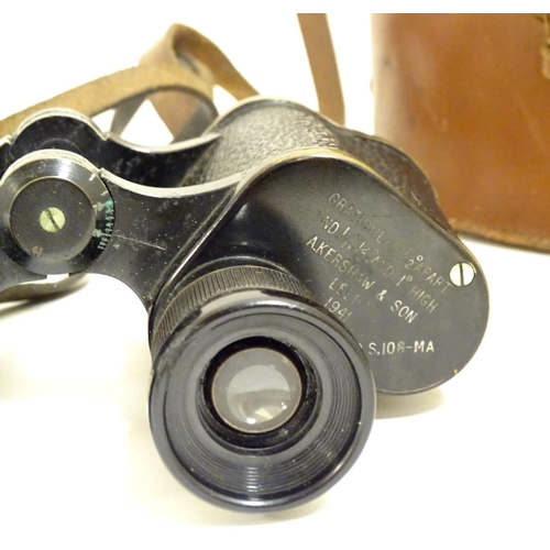 931 - A cased pair of binoculars / Field Glasses by A. Kershaw & Sons, Leeds, stamped 1941, approximately ... 