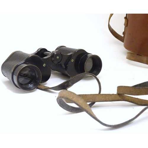 931 - A cased pair of binoculars / Field Glasses by A. Kershaw & Sons, Leeds, stamped 1941, approximately ... 