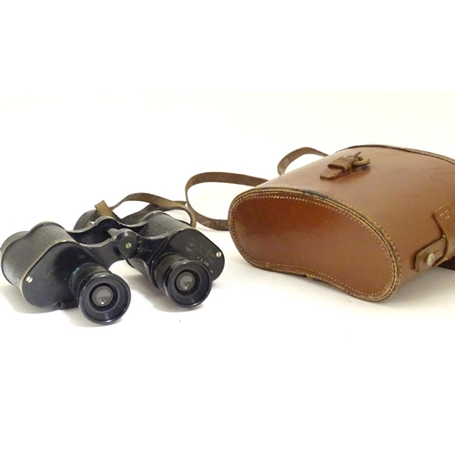 931 - A cased pair of binoculars / Field Glasses by A. Kershaw & Sons, Leeds, stamped 1941, approximately ... 