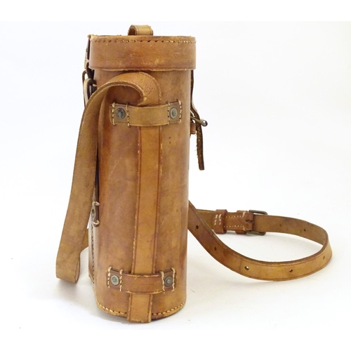 932 - A pair of Binoculars / Field Glasses by Chevalier, Paris, with sunshades and associated leather case