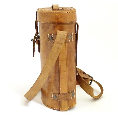 932 - A pair of Binoculars / Field Glasses by Chevalier, Paris, with sunshades and associated leather case