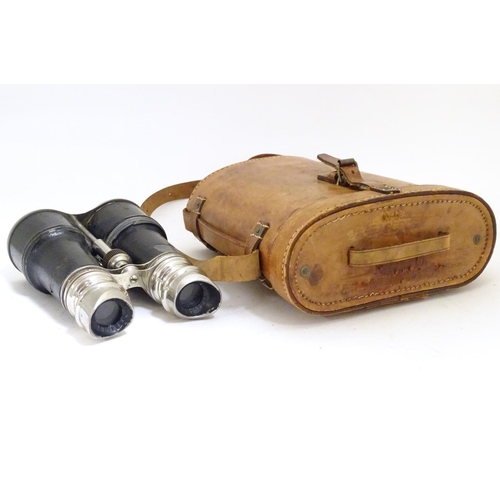 932 - A pair of Binoculars / Field Glasses by Chevalier, Paris, with sunshades and associated leather case