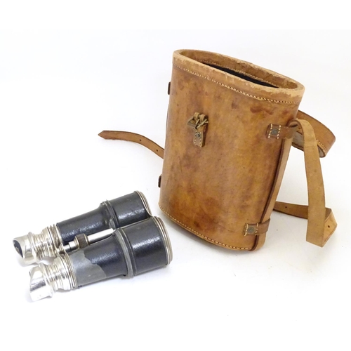 932 - A pair of Binoculars / Field Glasses by Chevalier, Paris, with sunshades and associated leather case