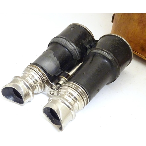 932 - A pair of Binoculars / Field Glasses by Chevalier, Paris, with sunshades and associated leather case