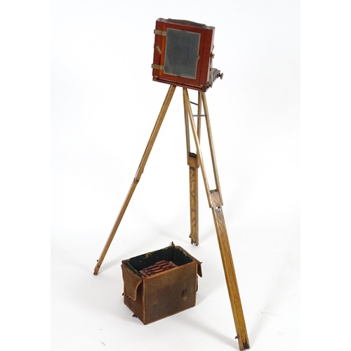 940 - A c1900 plate camera, of mahogany construction, bearing an ivorine plaque inscribed 'The Society - T... 