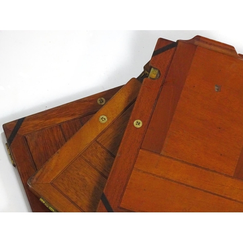 940 - A c1900 plate camera, of mahogany construction, bearing an ivorine plaque inscribed 'The Society - T... 