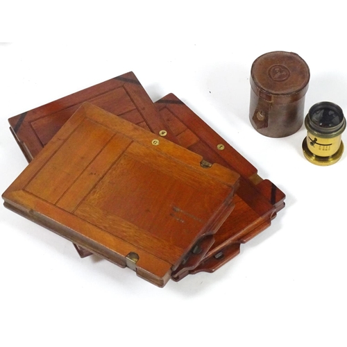 940 - A c1900 plate camera, of mahogany construction, bearing an ivorine plaque inscribed 'The Society - T... 