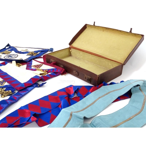 944 - A large quantity of Freemasons / Masonic regalia, to include aprons, sashes, collars, collars with p... 