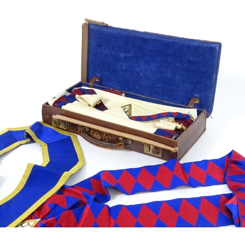 944 - A large quantity of Freemasons / Masonic regalia, to include aprons, sashes, collars, collars with p... 