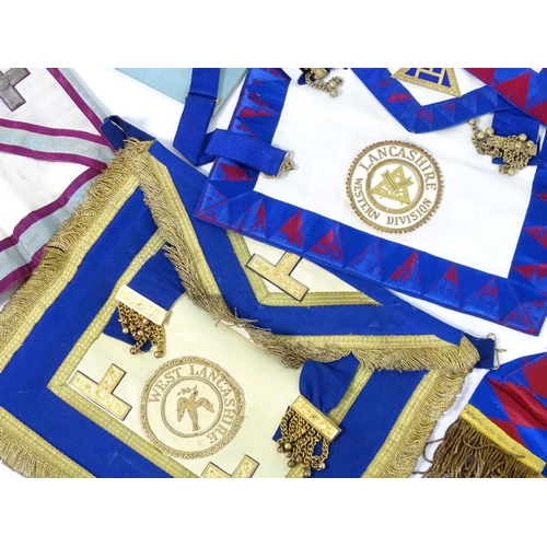 944 - A large quantity of Freemasons / Masonic regalia, to include aprons, sashes, collars, collars with p... 