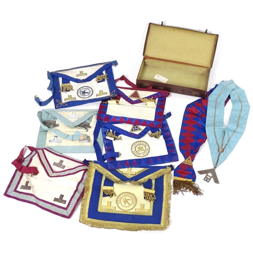 944 - A large quantity of Freemasons / Masonic regalia, to include aprons, sashes, collars, collars with p... 