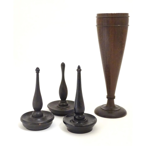 949 - Four items of early 20thC treen, comprising three ring trees / jewellery holders and a spill vase. V... 