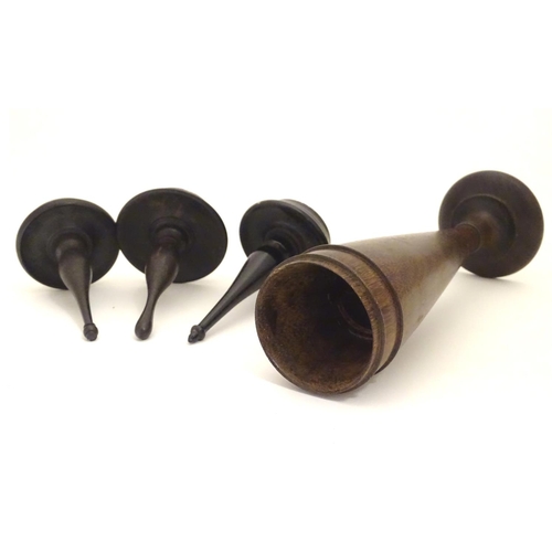 949 - Four items of early 20thC treen, comprising three ring trees / jewellery holders and a spill vase. V... 