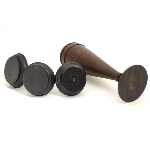 949 - Four items of early 20thC treen, comprising three ring trees / jewellery holders and a spill vase. V... 