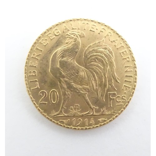 553 - A French Republic 20 franc gold coin, 1914, approximately 6.5g