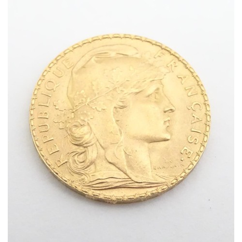 553 - A French Republic 20 franc gold coin, 1914, approximately 6.5g