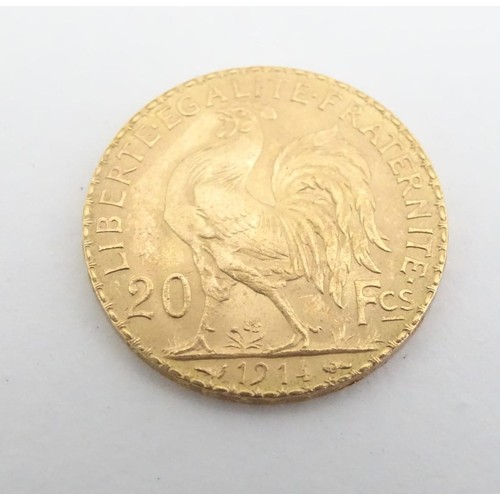 553 - A French Republic 20 franc gold coin, 1914, approximately 6.5g