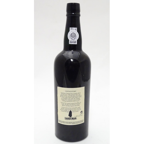 1136 - A 75cl bottle Sandemans vintage 1966 port, in presentation case, the lid inset with barman's tools (... 