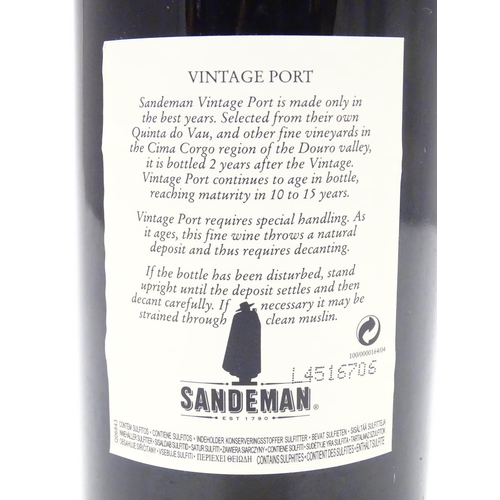 1136 - A 75cl bottle Sandemans vintage 1966 port, in presentation case, the lid inset with barman's tools (... 