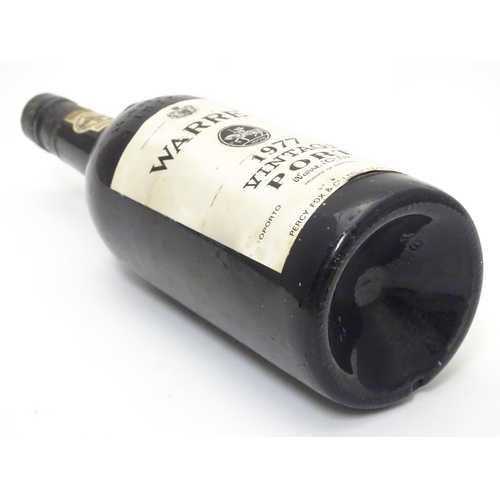 1138 - A 75cl bottle of Warre's 1977 vintage port, 11 1/4