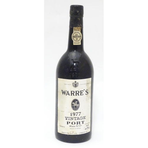 1138 - A 75cl bottle of Warre's 1977 vintage port, 11 1/4