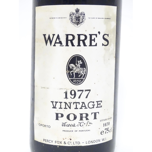 1138 - A 75cl bottle of Warre's 1977 vintage port, 11 1/4