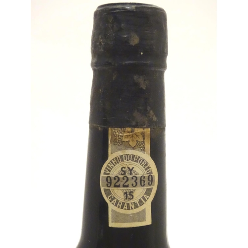 1138 - A 75cl bottle of Warre's 1977 vintage port, 11 1/4