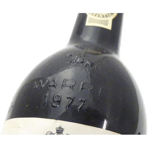 1138 - A 75cl bottle of Warre's 1977 vintage port, 11 1/4