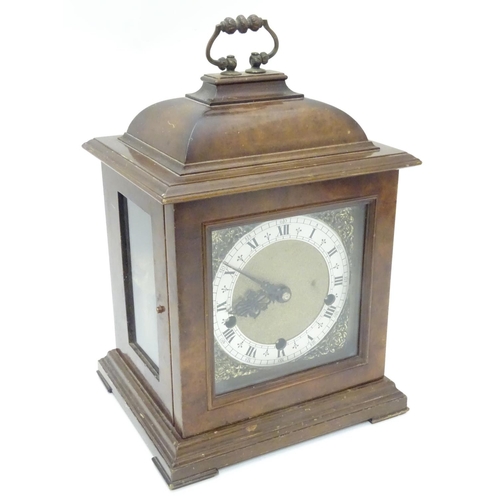 1175 - A 20thC Smiths walnut cased bracket clock in walnut case with silvered Roman chapter ring , hammered... 