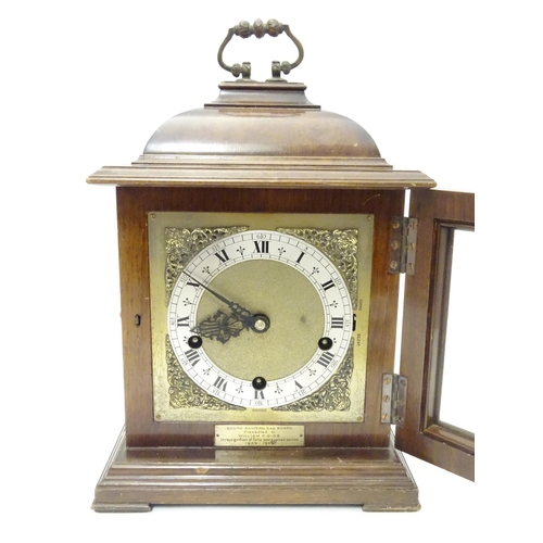 1175 - A 20thC Smiths walnut cased bracket clock in walnut case with silvered Roman chapter ring , hammered... 