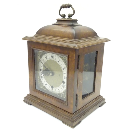 1175 - A 20thC Smiths walnut cased bracket clock in walnut case with silvered Roman chapter ring , hammered... 