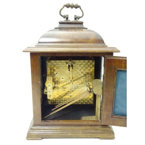 1175 - A 20thC Smiths walnut cased bracket clock in walnut case with silvered Roman chapter ring , hammered... 