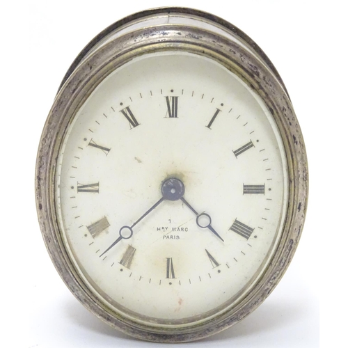 1178 - A silver plate cased clock / timepiece , the enamel dial marked Hry Marc Paris.  Approx 3 1/2