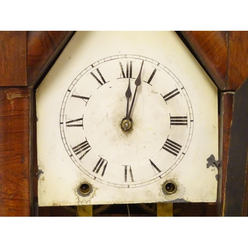 1180 - An American mantle clock with glazed door and having paper trade label to interior for 'Jerome & Co.... 