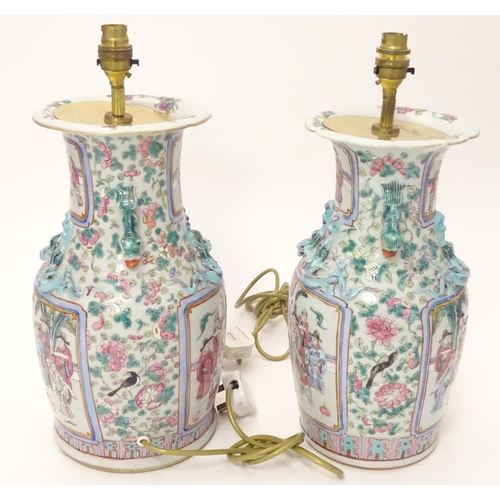 1223A - Two table lamps formed from Chinese ceramic vases of baluster form decorated with figures in an inte... 