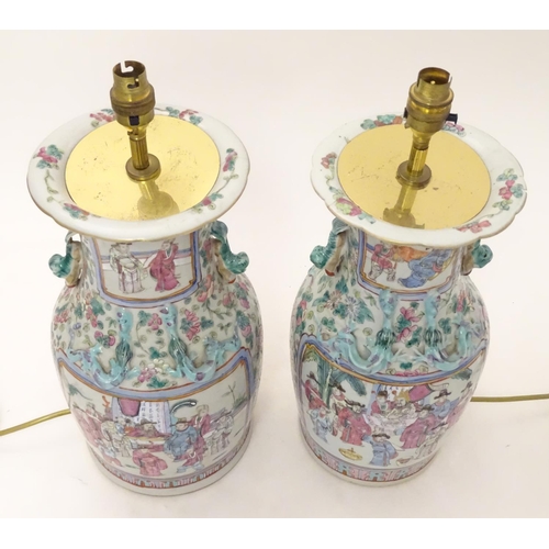 1223A - Two table lamps formed from Chinese ceramic vases of baluster form decorated with figures in an inte... 