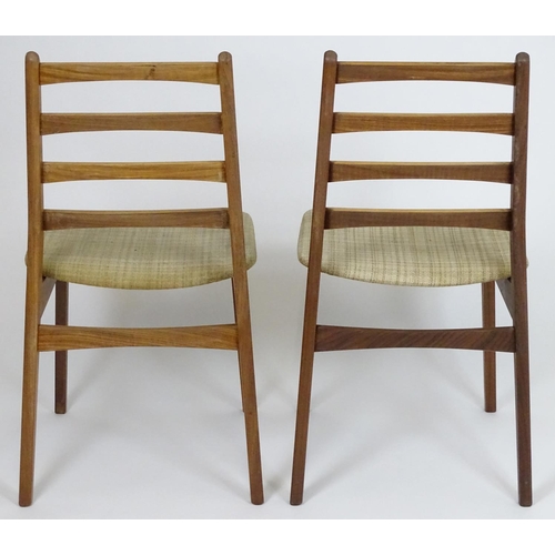 1240A - Vintage Retro, Mid Century: a pair of Danish dining chairs, the teak frames fitted with upholstered ... 