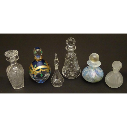 153 - 6 assorted glass / scent bottles The tallest 6