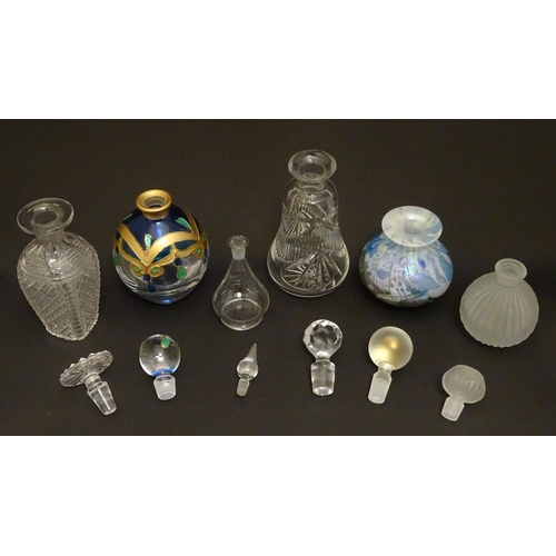 153 - 6 assorted glass / scent bottles The tallest 6