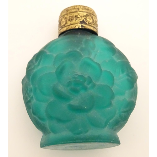 162 - A green glass scent / perfume bottle with atomiser top  together with two scent / snuff bottle with ... 