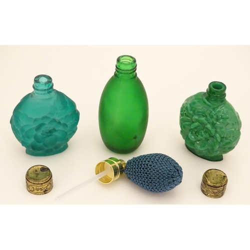 162 - A green glass scent / perfume bottle with atomiser top  together with two scent / snuff bottle with ... 