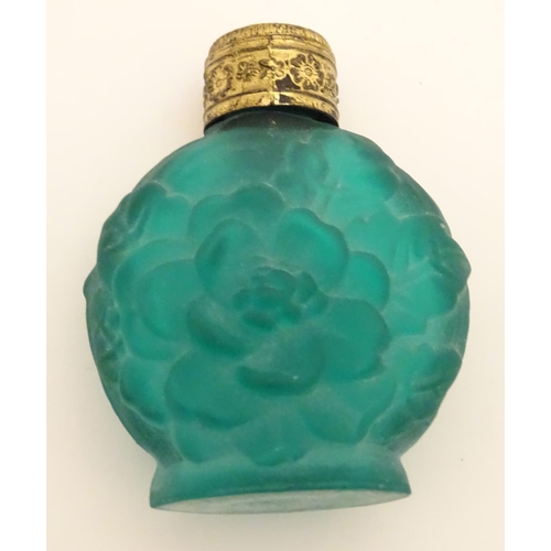 162 - A green glass scent / perfume bottle with atomiser top  together with two scent / snuff bottle with ... 