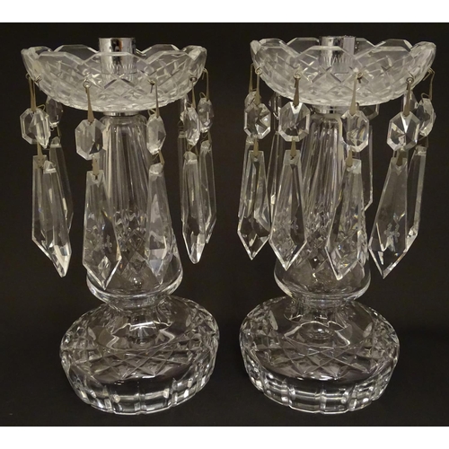 163 - A pair of Waterford Crystal cut glass table lustres. Approx. 9 1/4