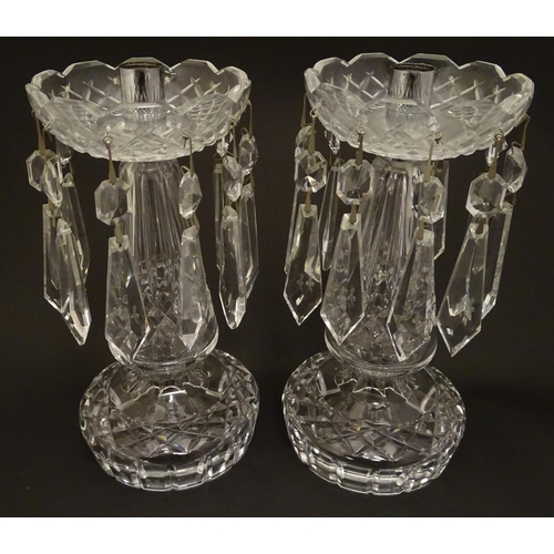 163 - A pair of Waterford Crystal cut glass table lustres. Approx. 9 1/4