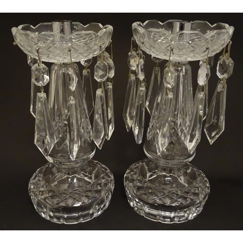 163 - A pair of Waterford Crystal cut glass table lustres. Approx. 9 1/4