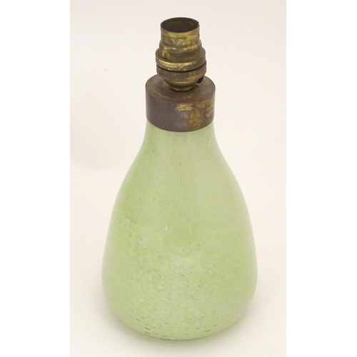 175 - A retro art glass table lamp, the lime green glass base with bubble detail. Possible Murano. Approx ... 