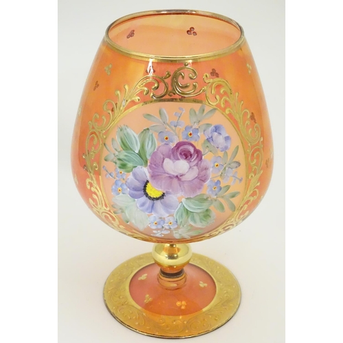 177 - A large Bohemian ruby glass vase shaped like an oversized  brandy glass decorated with gold gilt and... 